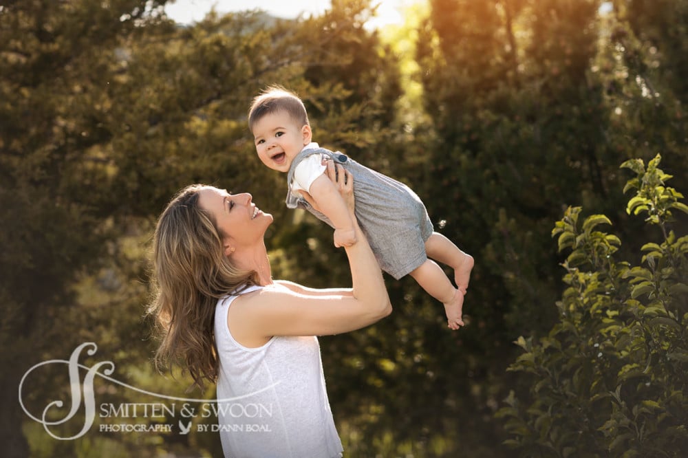 mom holding baby in air {boulder baby photographer}