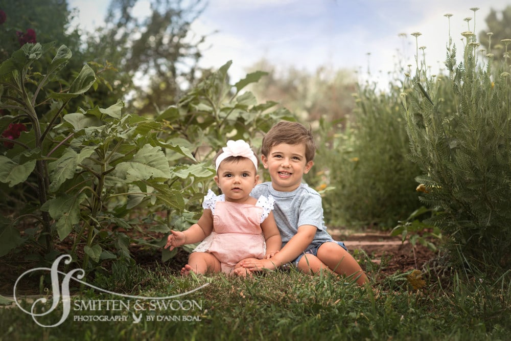 brother and sister hugging in the garden {boulder family photographer}