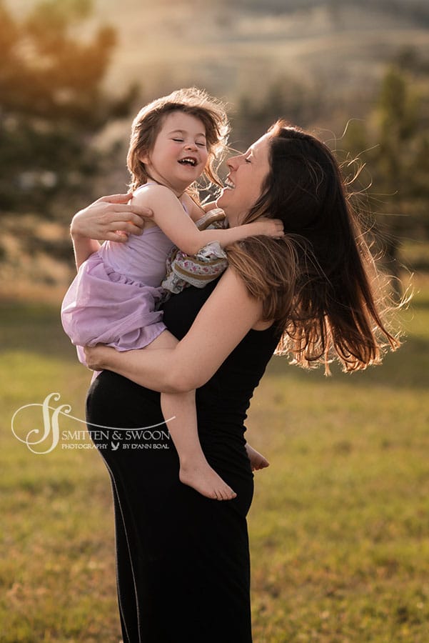 pregnant mom and baby girl laughing {boulder maternity photographer}