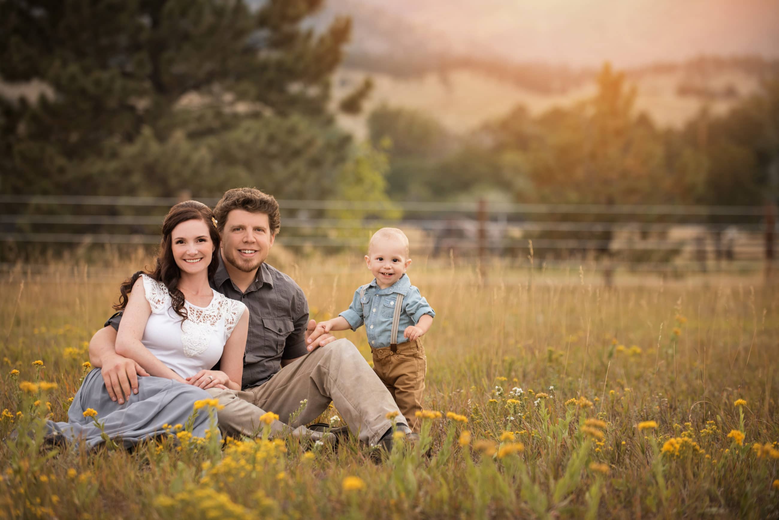 family of three in field of flowers - boulder photographer