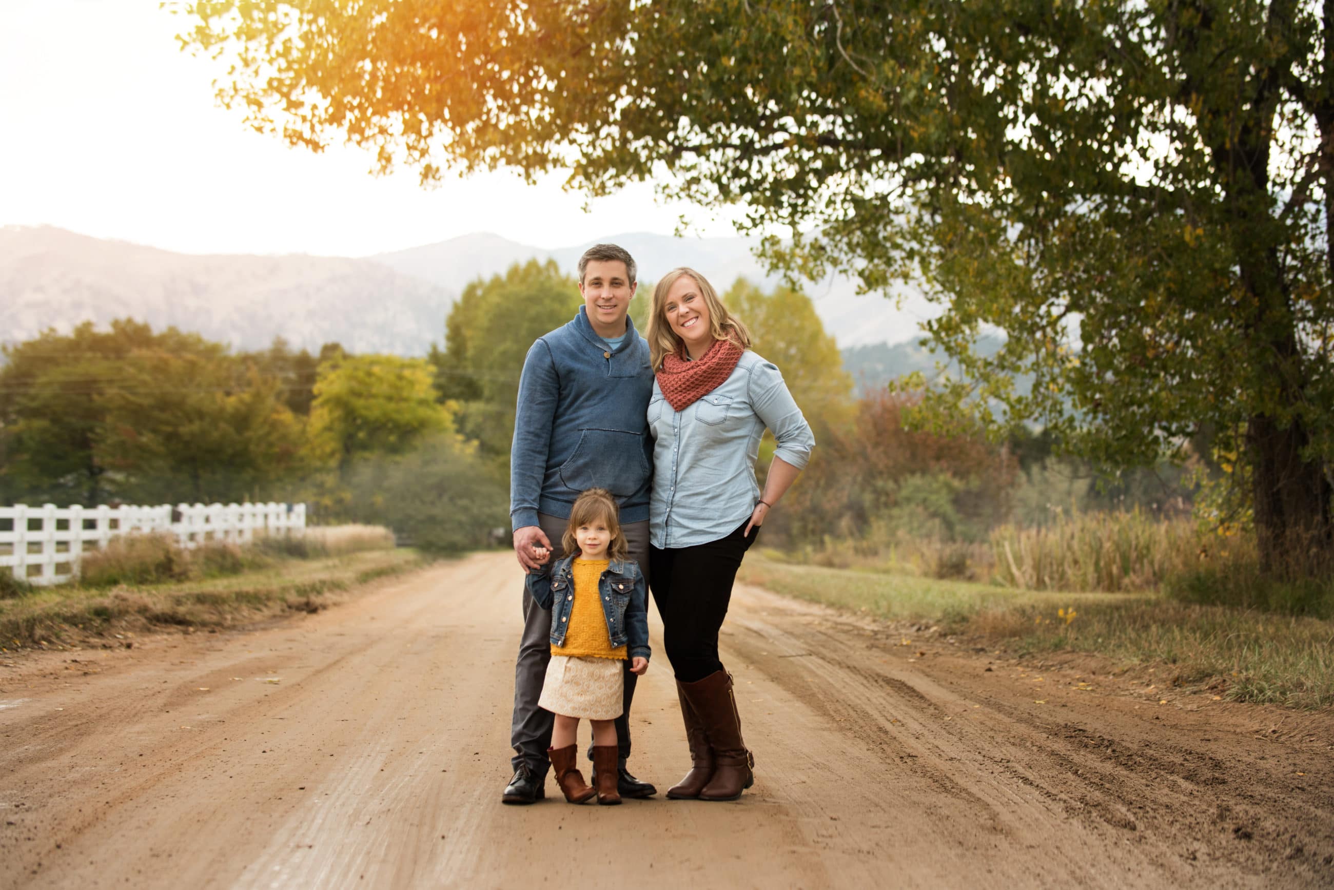 boulder family photographer - family of three standing in road